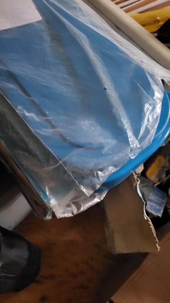 Two camping stoves with stand