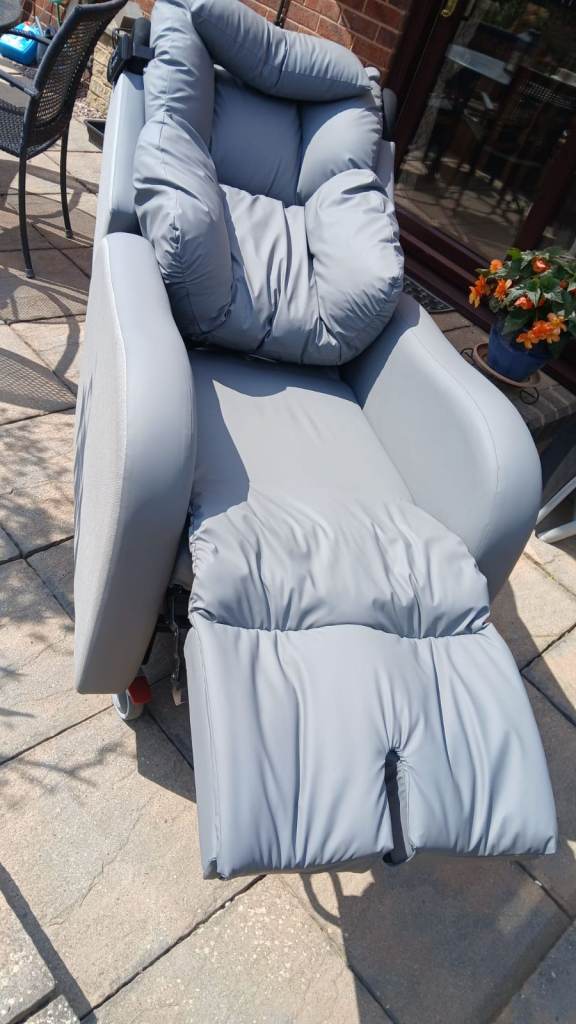 Grey Recliner Armchair –new condition