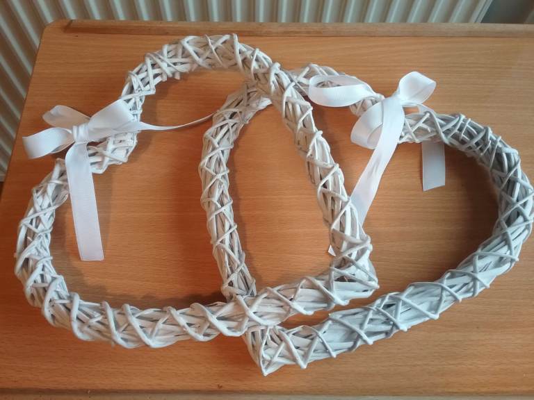 Pair of heart-shaped wicker wreaths