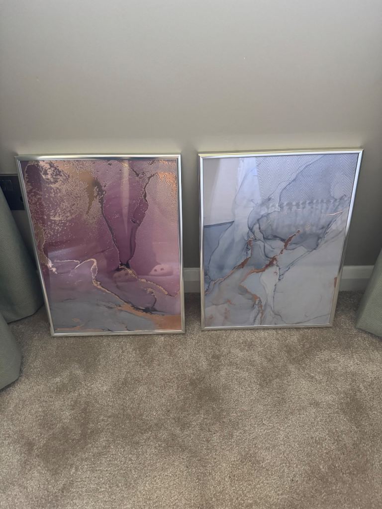 Abstract metallic prints in silver frames