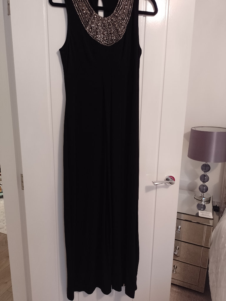 Ladies Long  black Planet Evening Dress with bling to front neckline. 
