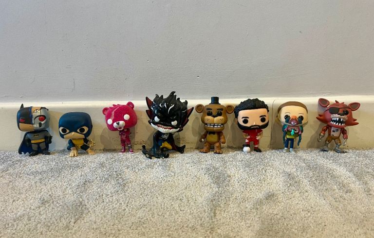 8 Funko pops