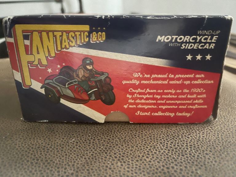 FANTASTIC and CO Motorcycle and Sidecar, collectors' series. Wind-up model. 