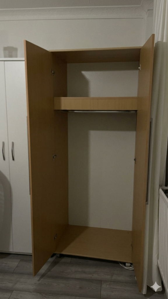 price dropped - Spacious oak finish 2 door wardrobe 