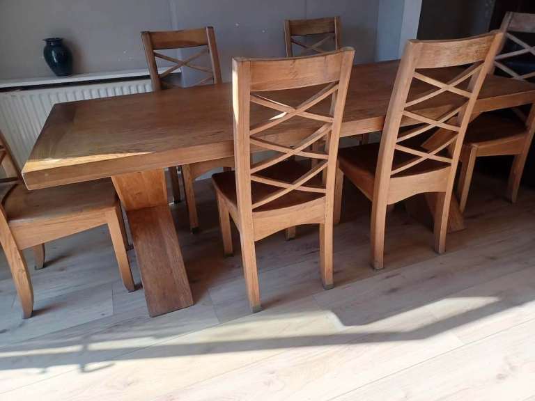Oak table and 6 chairs with matching dresser