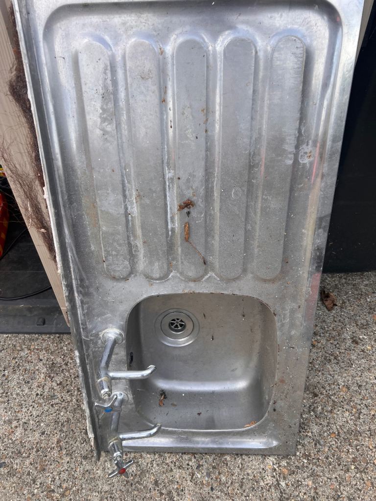Kitchen sink and taps