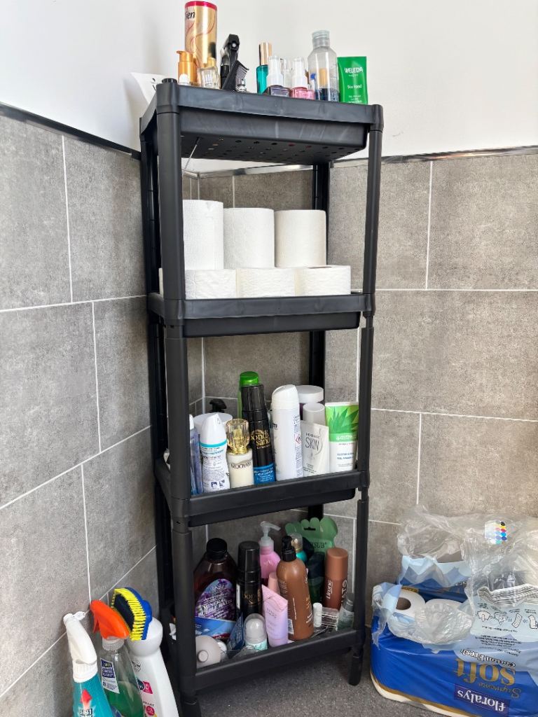 Black Plastic 4-Tier Storage Unit – Good Condition