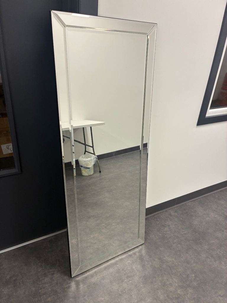 Mirror, double ladder and some step ladders