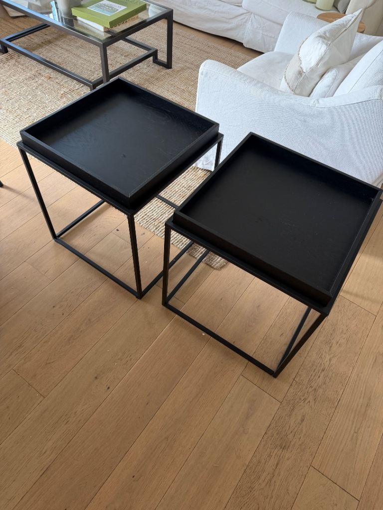 Two black wood side tables 