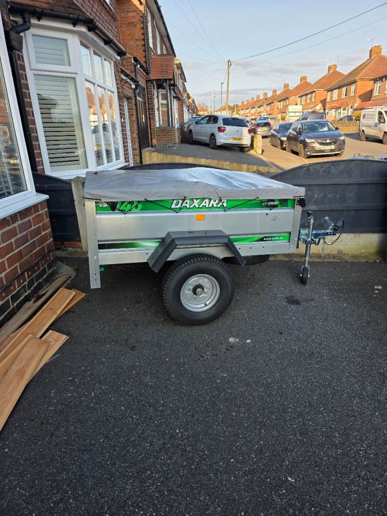 Trailer with spare tyre and jockey wheel