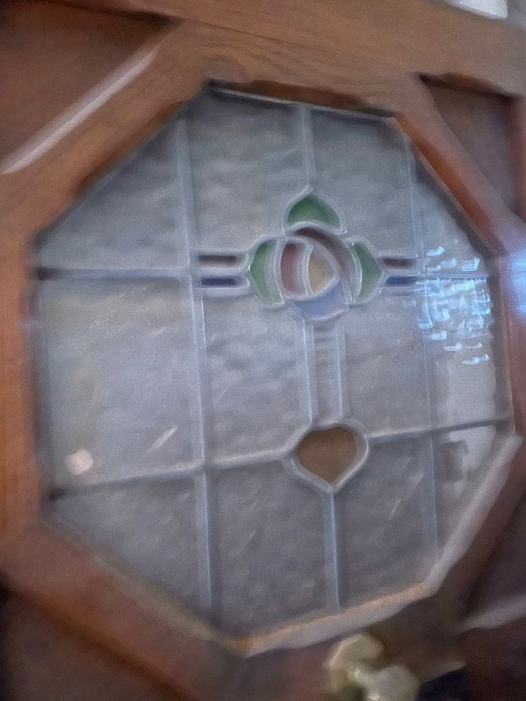 Hard wood front door with stained glass 