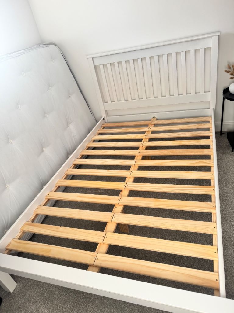 Small white double bed 
