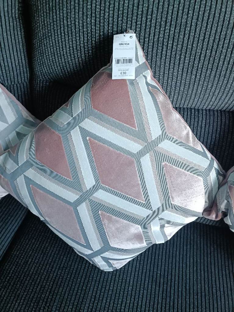 4 new next cushions with labels still attached 
