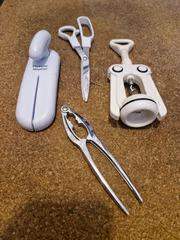 tin opener, scissors, corkscrew & nut cracker