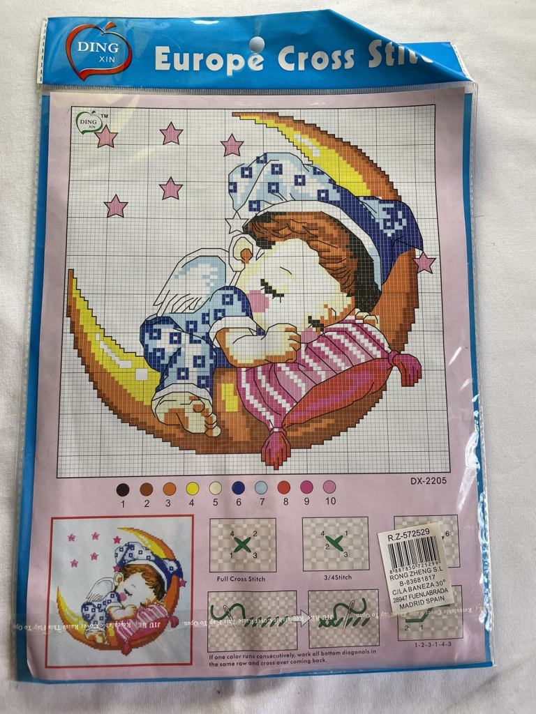 Sleeping moon child cross stitch pattern, thread and Aida