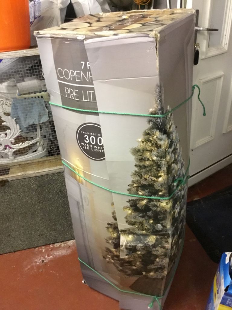 7ft Copenhagen prelit Christmas tree with snow and berries on the branches. £10