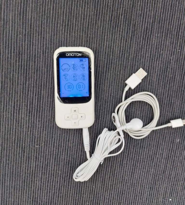 OMOTON TENSE Unit Muscle Stimulator. RechargeableOMOTON TENSE Unit Muscle Stimulator.