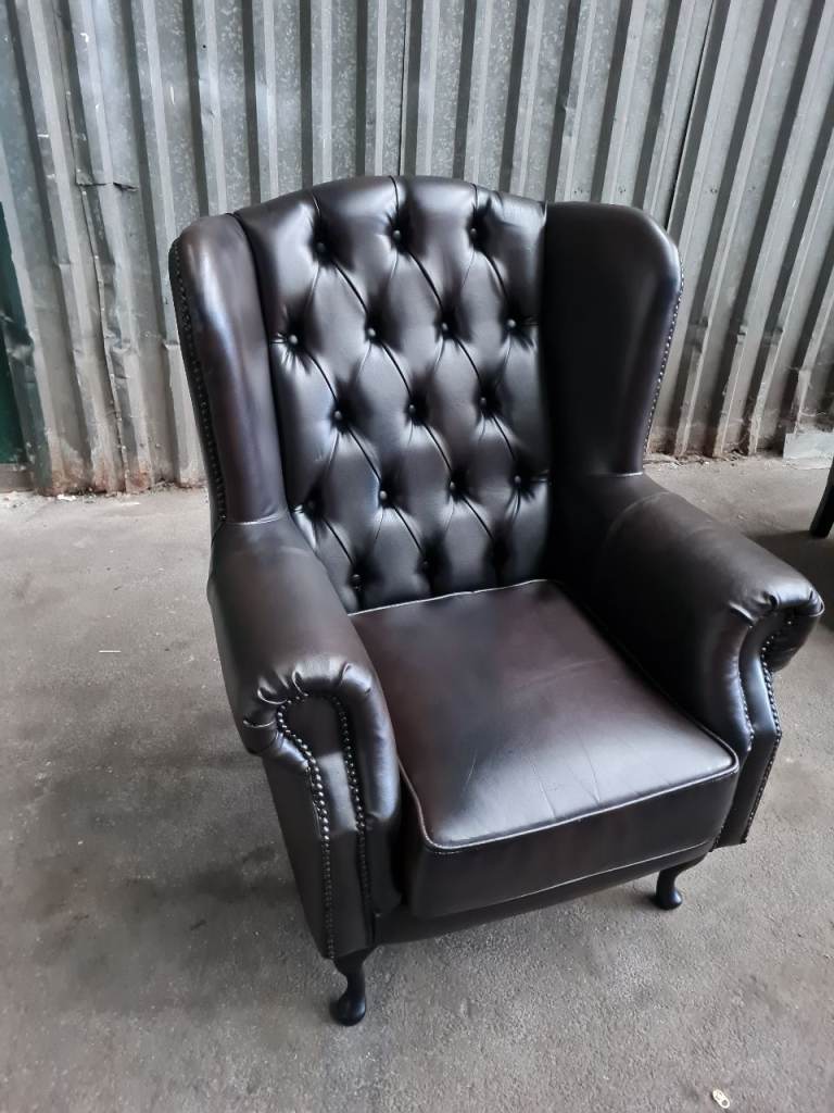 Can deliver.Chesterfield wingback chair.brown faux leather.can deliver