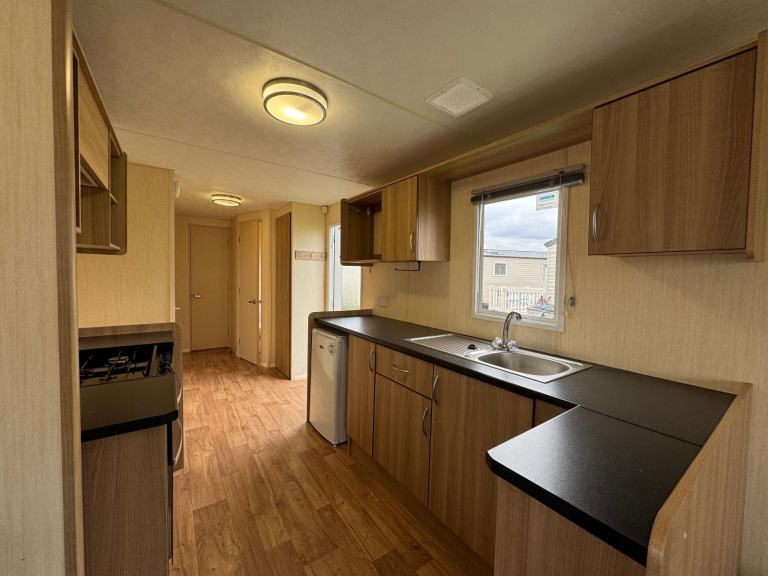 Cheap sited static caravan for sale North Wales - family run park low site fees