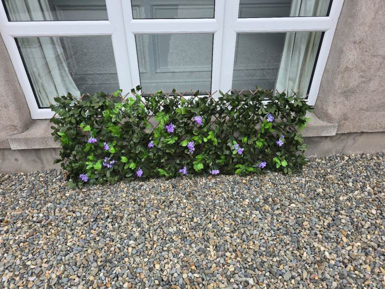 6ft wide extendable/trellis artificial greenery with purple flowers, 