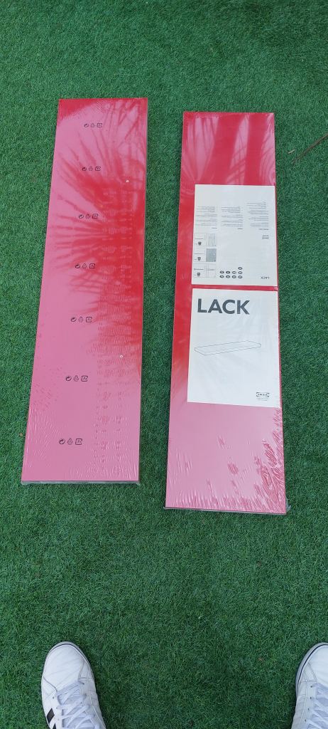 Red IKEA floating shelves 