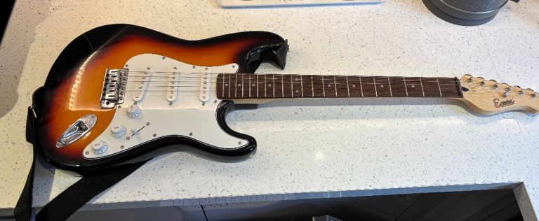Encore sunburst electric guitar