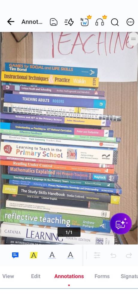 Bundle of academic books used for teaching degree