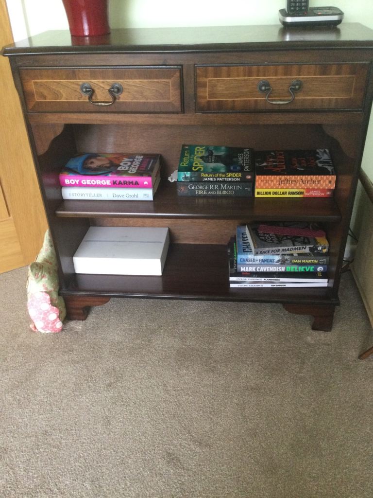 Small mahogany bookcase with two drawers approx 30 inches wide 12 inches deep and 29 inches high