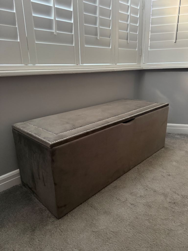 Luxury grey velvet storage ottoman with studded detailing