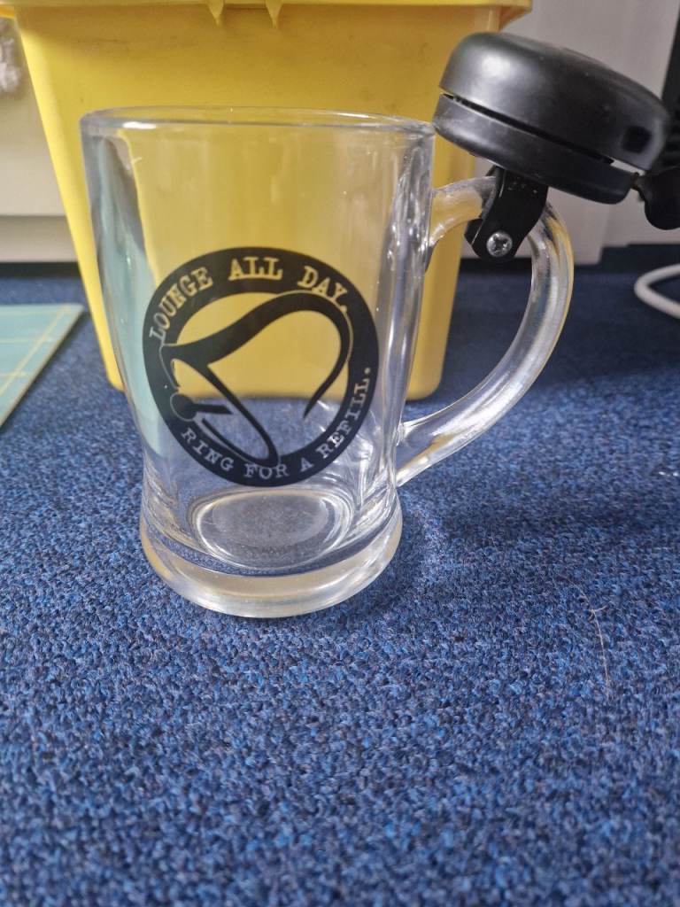 Novelty 'ring for refill' glass