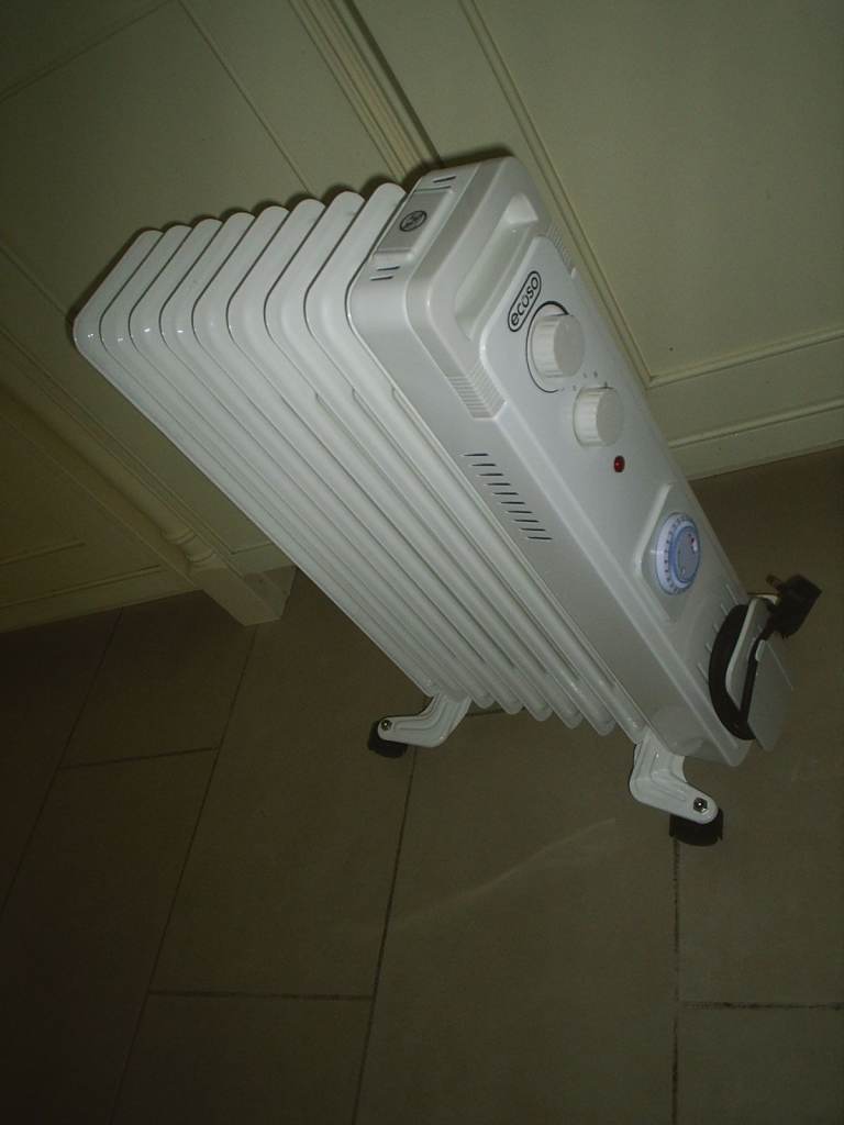 NEW Ecoso Electric Heater - 2KW Portable Oil Filled Radiator. Cost £70 ...