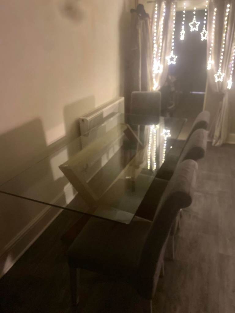 Large glass table and 4 chairs 
