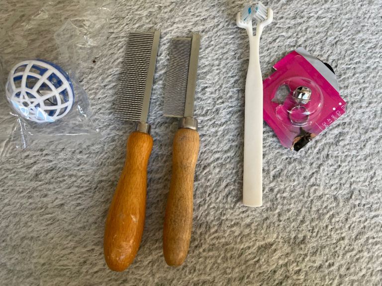 Cat comb and toothbrush and bell