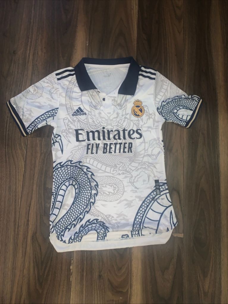 Blue and white dragon Real Madrid football jersey 