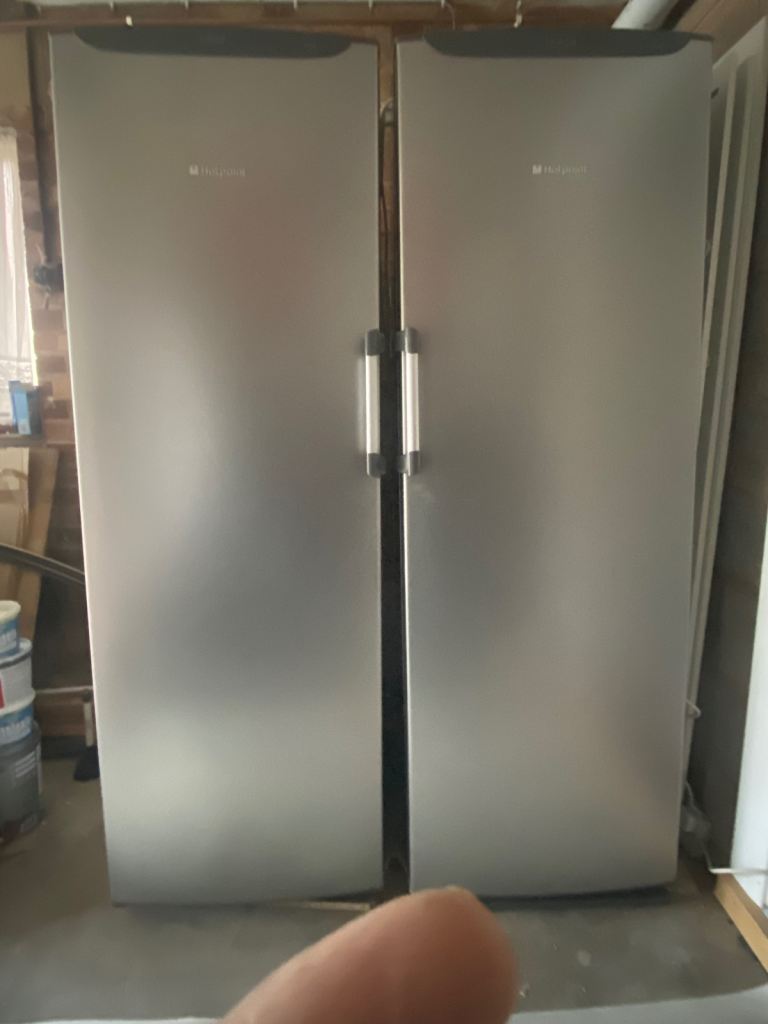 Hotpoint tall free standing freezer with matching fridge
