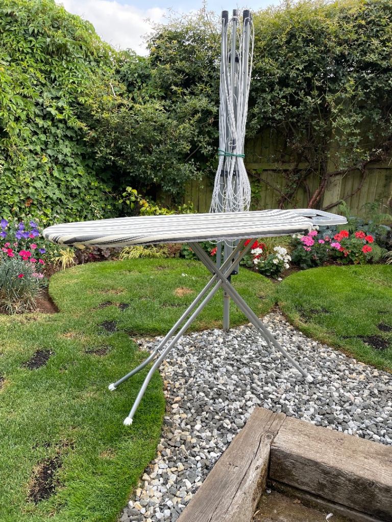 Ironing Board with Striped Cover – Good Condition