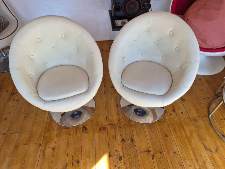 Two Cream Swivel Dining Chairs - Modern Design