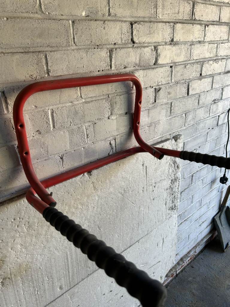 Red Wall-Mounted Folding Bike Storage Rack