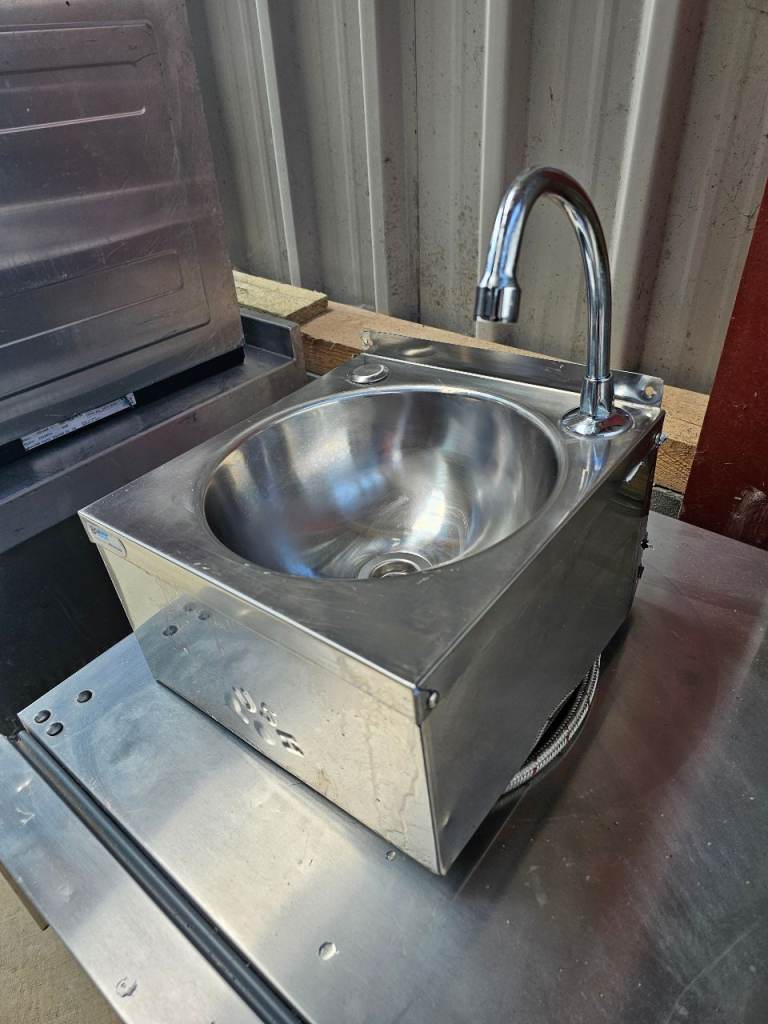 Stainless steel knee operated wash hand basin