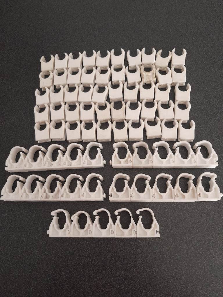 75 x Plastic Brackets for 15mm Copper Pipe