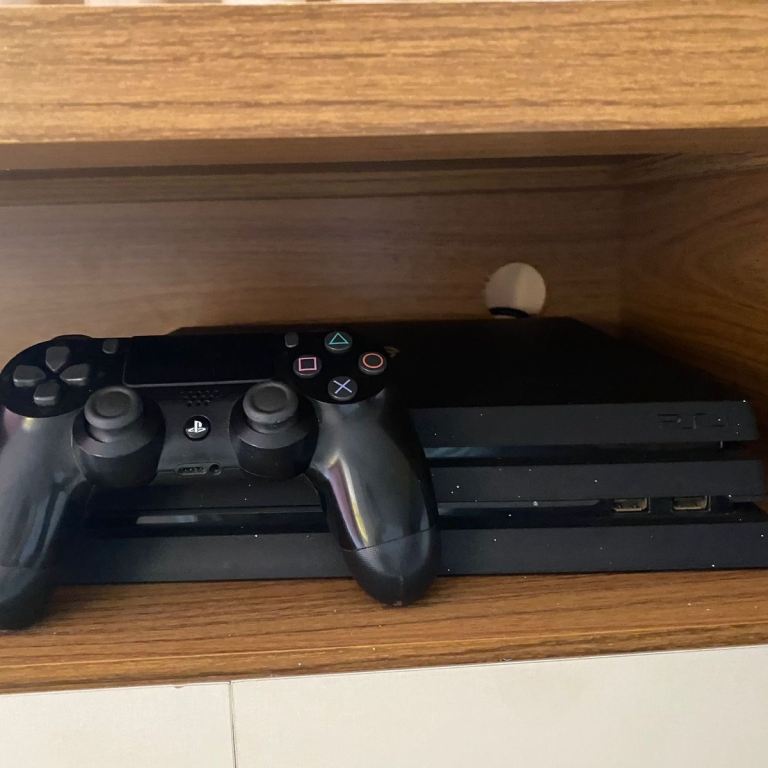 Sony PlayStation 4 Pro Console with Controller – Good Condition
