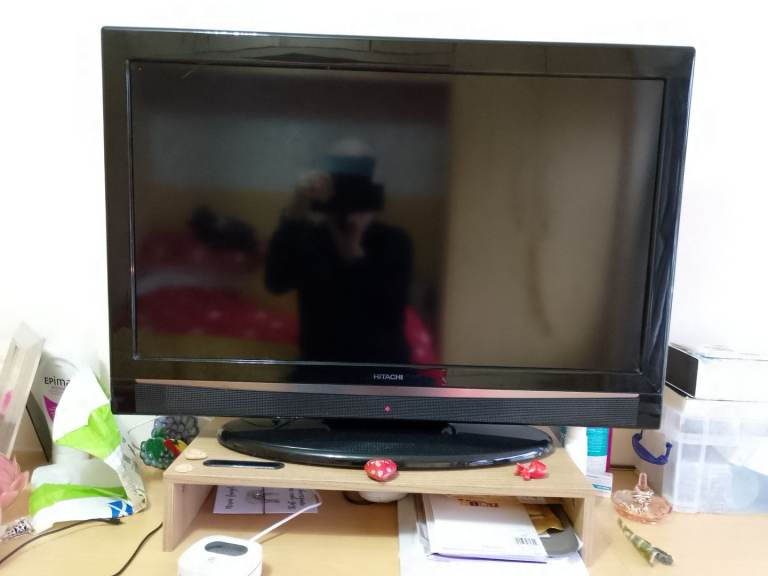 36"Hitachi flat screen TV with stand and remote