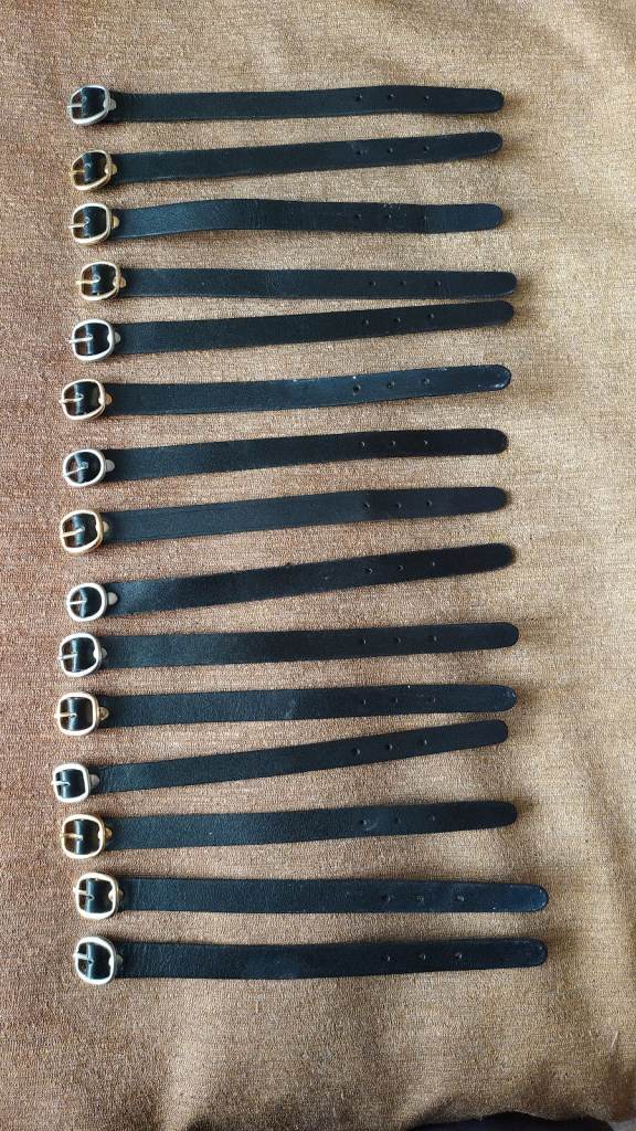 New black leather straps, useful as Luggage card straps.