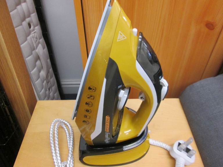 NEW - PHOENIX GOLD FREE-FLIGHT CORDLESS IRON at HAVEN TRUST CHARITY SHOP