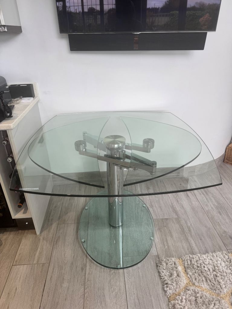 Dwell glass extendable dining table 