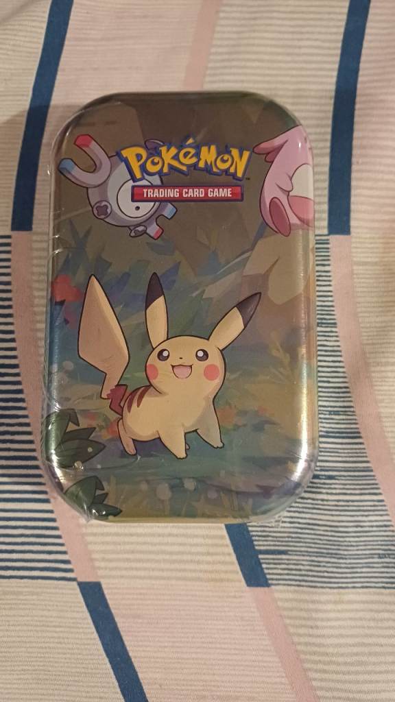 POKEMON SEALED TIN. UNSURE ON PACKS INSIDE 