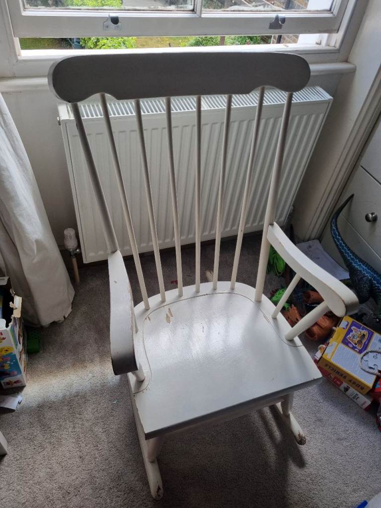 White wooden rocking chair