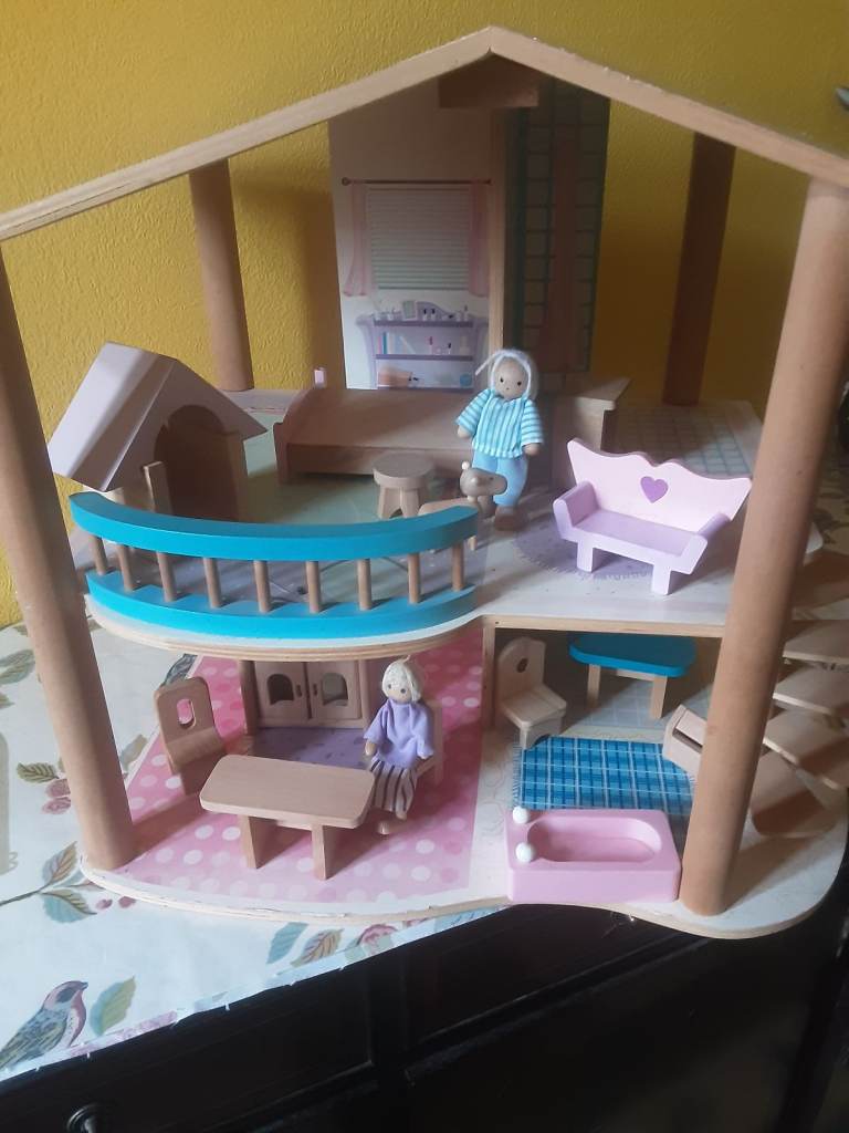 Wooden  Dolls house.   two posable people . wooden furniture ,dog kennel + puppy 