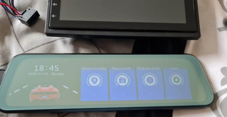 Multi media touch screen head unit with front and rear cameras