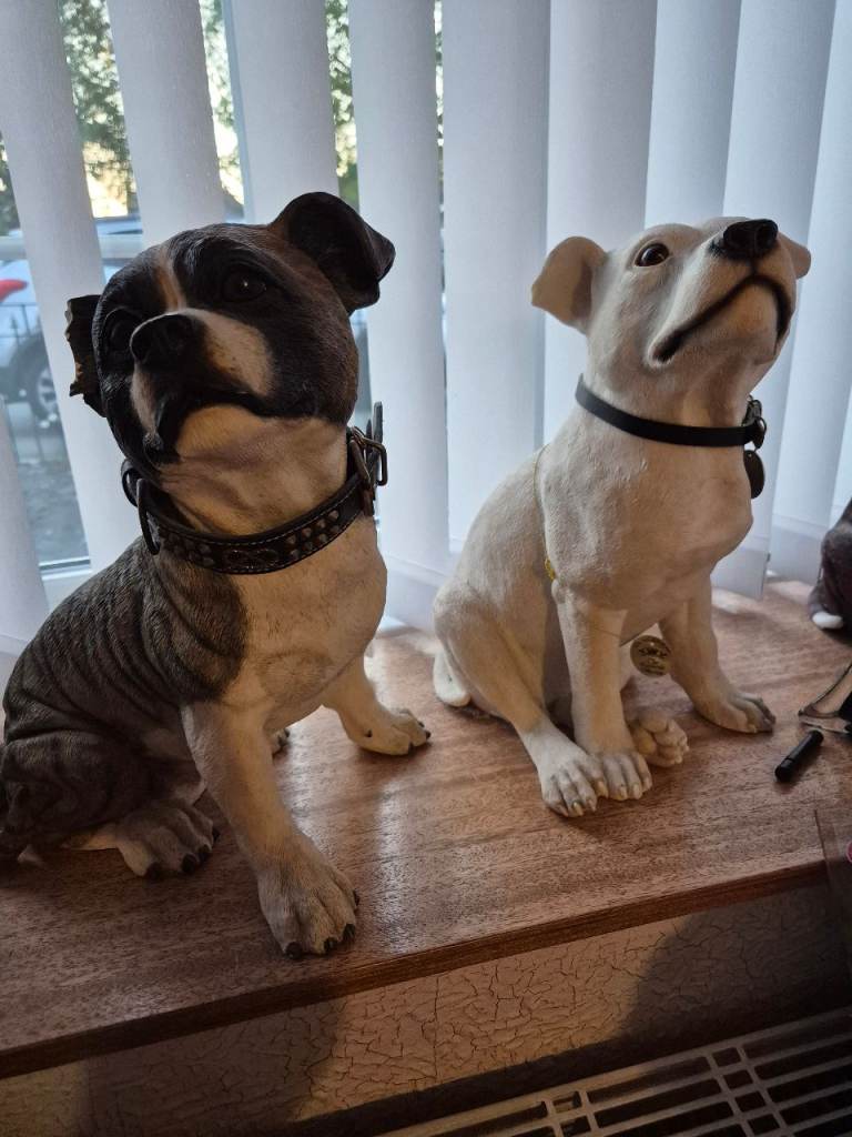 Collection of Staffordshire Bull Terrier ornaments (approx 15–20 pieces)